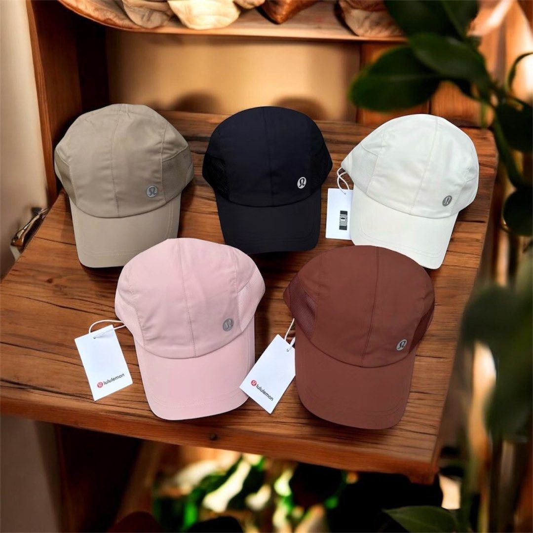 Lululemon Cap - Unisex (Category: Hats & Beanies) located in San Pedro. Submitted by lifebeginsaftercoff33 (Listing ID 1458655892, Image 1). Description: - Brand new Lululemon caps - Available colors: Beige, Black, White, Pink, Brown - Made with lightweight, breathable material - Ideal for everyday wear and workouts - Features iconic Lululemon logo - Tags are still attached - Size: OS 2,000 each.