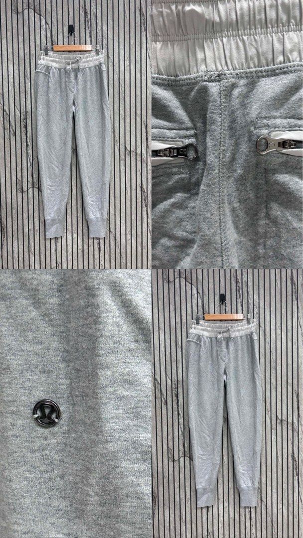 Lululemon Grey Joggers with Zipper Pockets (Category: Activewear) located in Malasiqui. Submitted by m3dus4 (Listing ID 1458628237, Image 1). Description: - Grey Lululemon joggers - Elastic waistband with drawstring - Two zippered front pockets - Small Lululemon logo on left leg - Ribbed ankle cuffs - Ideal for comfortable and stylish everyday wear Missing tag best fits small to medium .