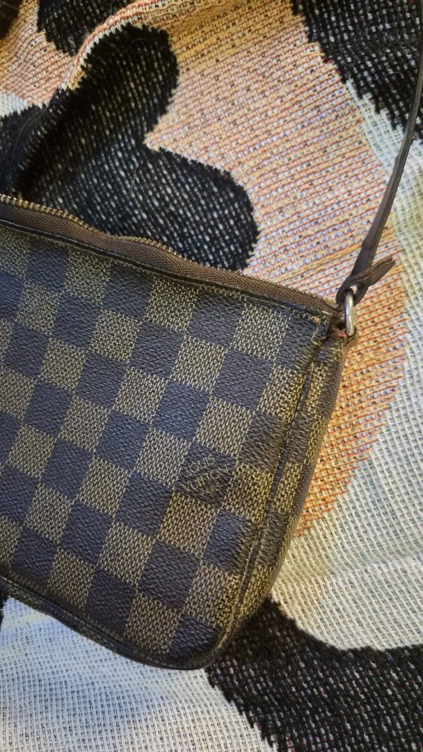 LV Damier Pochette (Category: Luxury Bags & Wallets) located in Manila. Submitted by declutterwithme__ (Listing ID 1458624820, Image 3). Description: Authentic LV Damier Pochette Code: CA 3710 Needs bag spa no inclusions bag only rfs: decluttering .