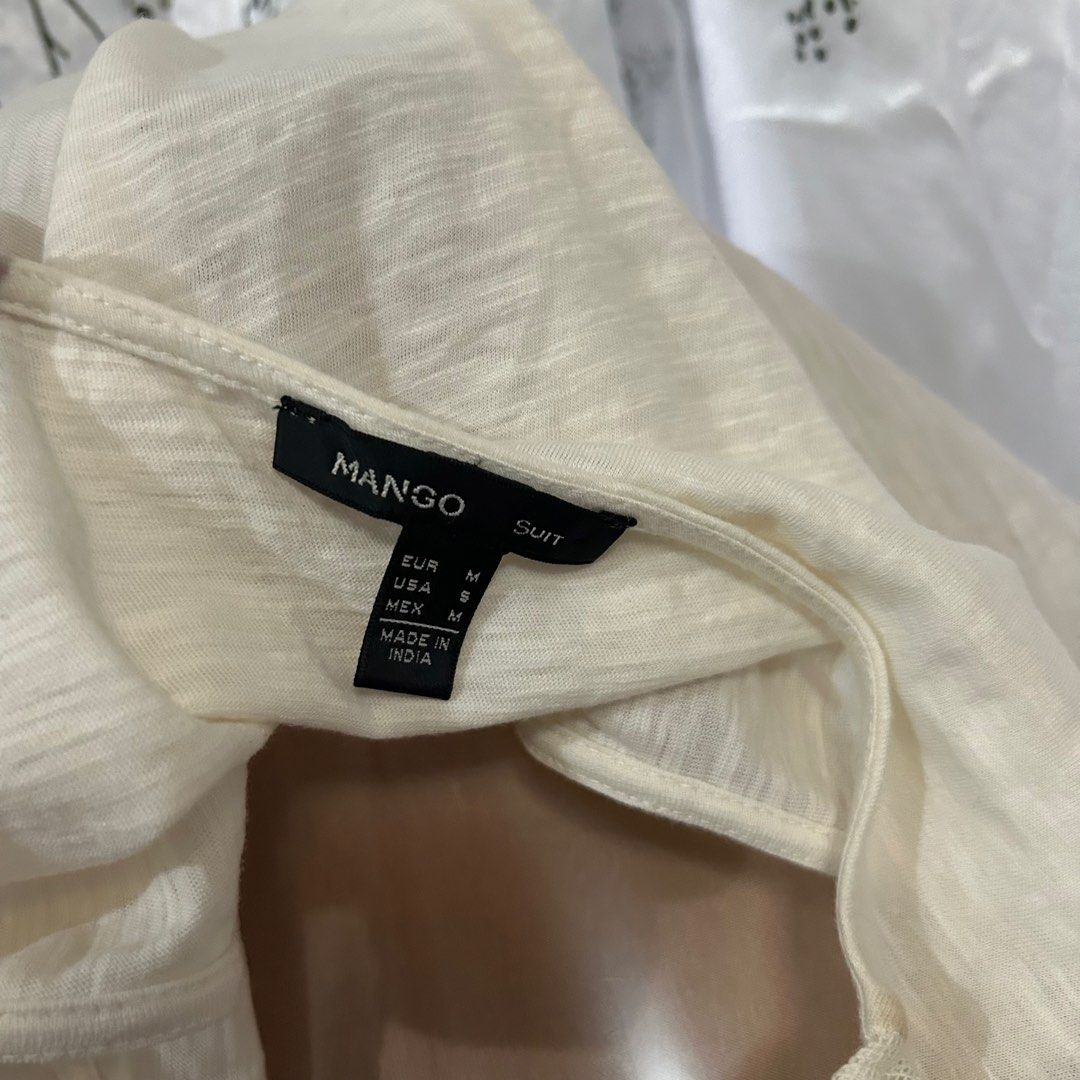 Mango Sleeveless Blouse (Category: Blouses) located in San Pedro. Submitted by clothesyph (Listing ID 1458640212, Image 2). Description: ⊹ preloved — in good condition ⊹ size: fits medium to large check out my listings for more items! ▫️payment: gcash / bank transfer ▫️delivery: j&t / lalamove (can ship from bgc or san pedro, laguna).
