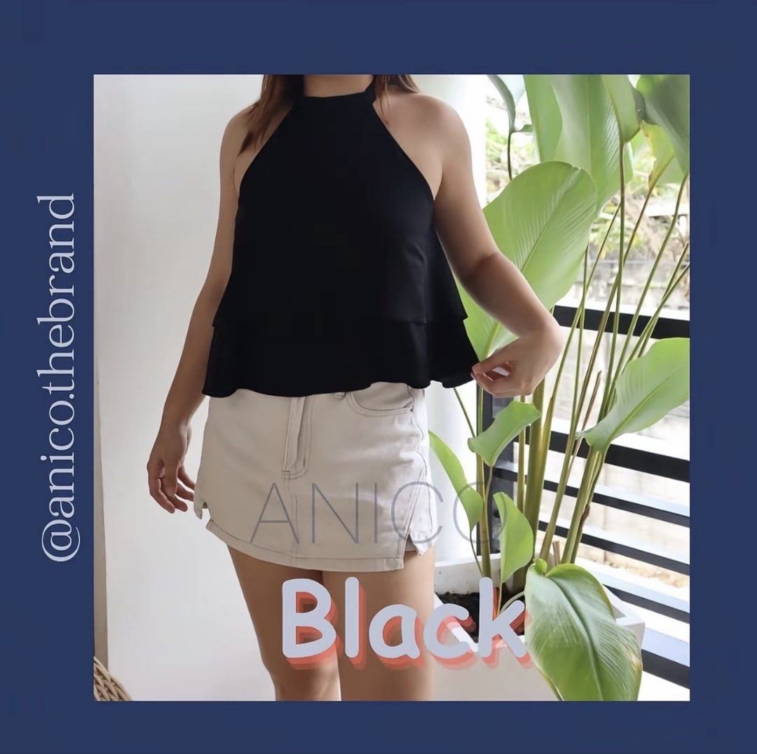 Marian key hole back halter neck double layer top (Category: Sleeveless) located in Binan City. Submitted by iluvm0nchichi (Listing ID 1458680002, Image 1). Description: - Black halter neck top - Tiered ruffle peplum hem - Adjustable back ties - Lightweight fabric - Perfect for dressing up or down - Style with shorts or a skirt.