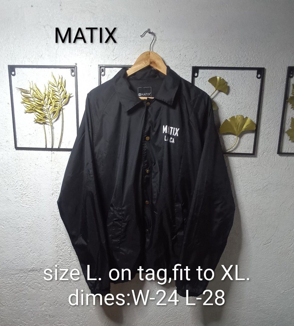 Matix Compton Surf Club Los Angeles CA Coach Jacket (Category: Coats, Jackets and Outerwear) located in Kawit. Submitted by deidzdzn (Listing ID 1458548899, Image 2). Description: - Brand: Matix - Type: Coach Jacket - Color: Black - Graphic: 'Compton Surf Club Los Angeles, CA' on back - Closure: Button-up front - Pockets: Yes - Tag Size: L - Fits Like: XL - Measurements: Width 24 inches, Length 28 inches.