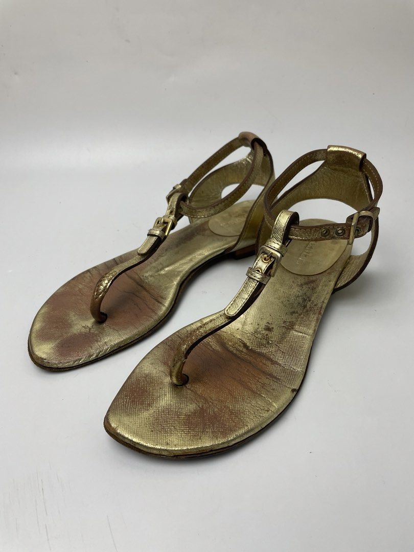 Max Mara Gold Metallic Leather T-Strap Flat Sandals (Category: Sandals) located in Manila. Submitted by rdtp2 (Listing ID 1458518437, Image 1). Description: size 35 sign of usage good condition 9/10.
