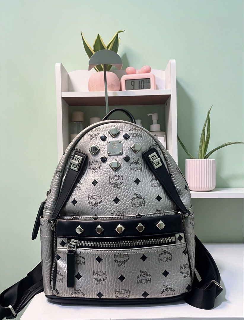 MCM Metallic Visetos Dual Stark Backpack (Category: Luxury Bags & Wallets) located in Manila. Submitted by thriftniyuno (Listing ID 1458637749, Image 1). Description: MCM Visetos Dual Stark Leather Backpack Black Logo Studs Good condition Sign of usage all zipper working.
