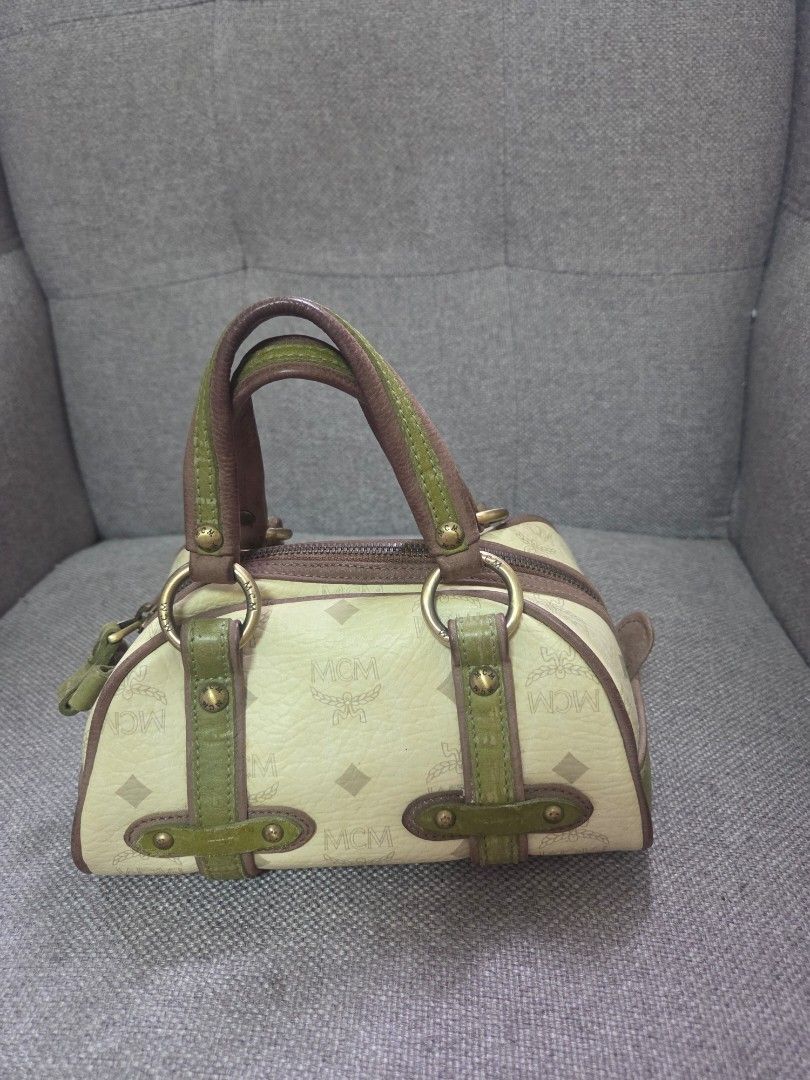 MCM Monogram Boston Bag (Category: Luxury Bags & Wallets) located in Muntinlupa City. Submitted by cpar07 (Listing ID 1458578440, Image 3). Description: - Authentic MCM Boston Bag - Classic all-over monogram print - Green leather trim and handles - Zipper closure .