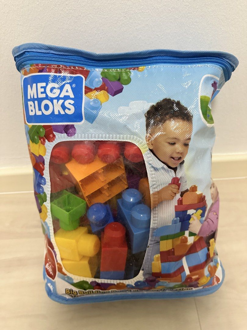 Mega Blocks (Category: Lego & Building Sets) located in Singapore. Submitted by gentlenesshope (Listing ID 1458583259, Image 1). Description: - Mega Bloks building toy set - Comes in a convenient zippered storage bag - Colorful and easy-to-handle blocks - Great for imaginative play and construction.