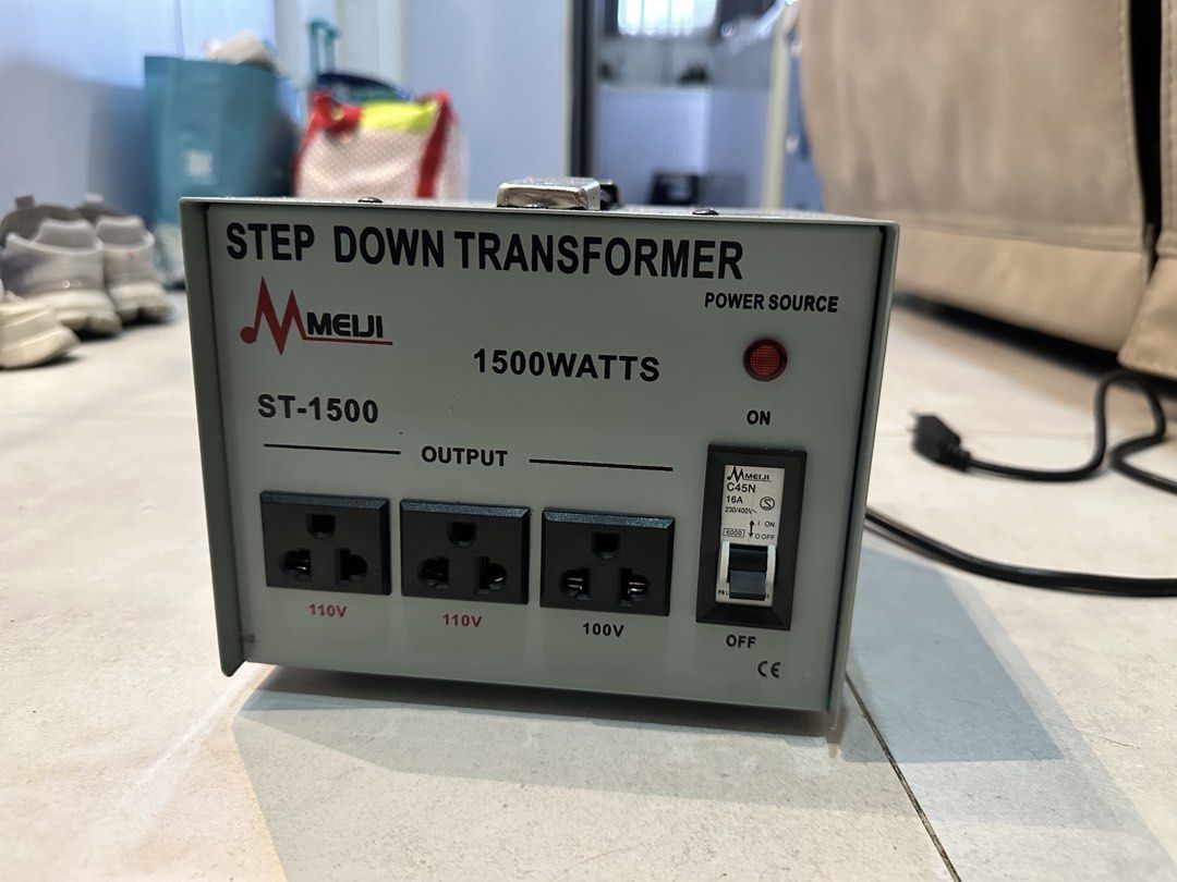 Meiji ST-1500 Step Down Transformer 1500 Watts (Category: Electrical, Adaptors & Sockets) located in Quezon City. Submitted by happysissies (Listing ID 1458558863, Image 2). Description: - Meiji ST-1500 Step Down Transformer - 1500 Watts Capacity - Input: 220V - Output: 2 x 110V sockets, 1 x 100V socket - Power Source Indicator Light - ON/OFF Switch - Fuse Protection Included - Ideal for converting voltage for your appliances Originally bought at
