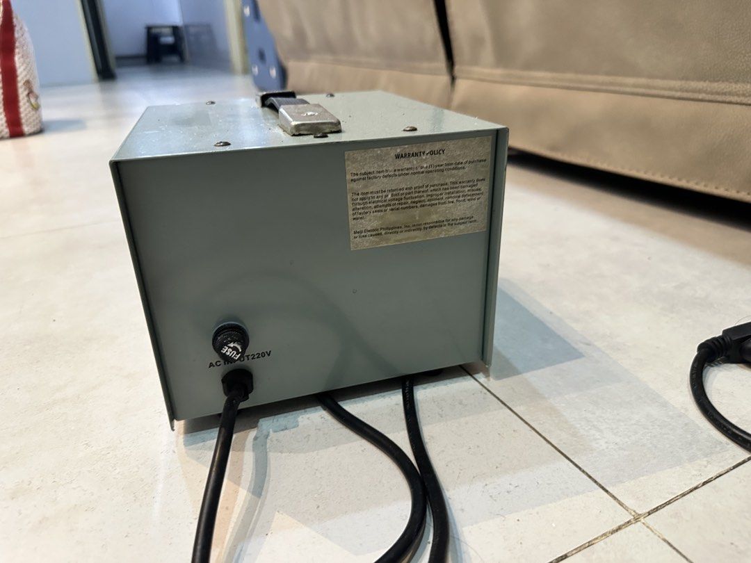 Meiji ST-1500 Step Down Transformer 1500 Watts (Category: Electrical, Adaptors & Sockets) located in Quezon City. Submitted by happysissies (Listing ID 1458558863, Image 3). Description: - Meiji ST-1500 Step Down Transformer - 1500 Watts Capacity - Input: 220V - Output: 2 x 110V sockets, 1 x 100V socket - Power Source Indicator Light - ON/OFF Switch - Fuse Protection Included - Ideal for converting voltage for your appliances Originally bought at