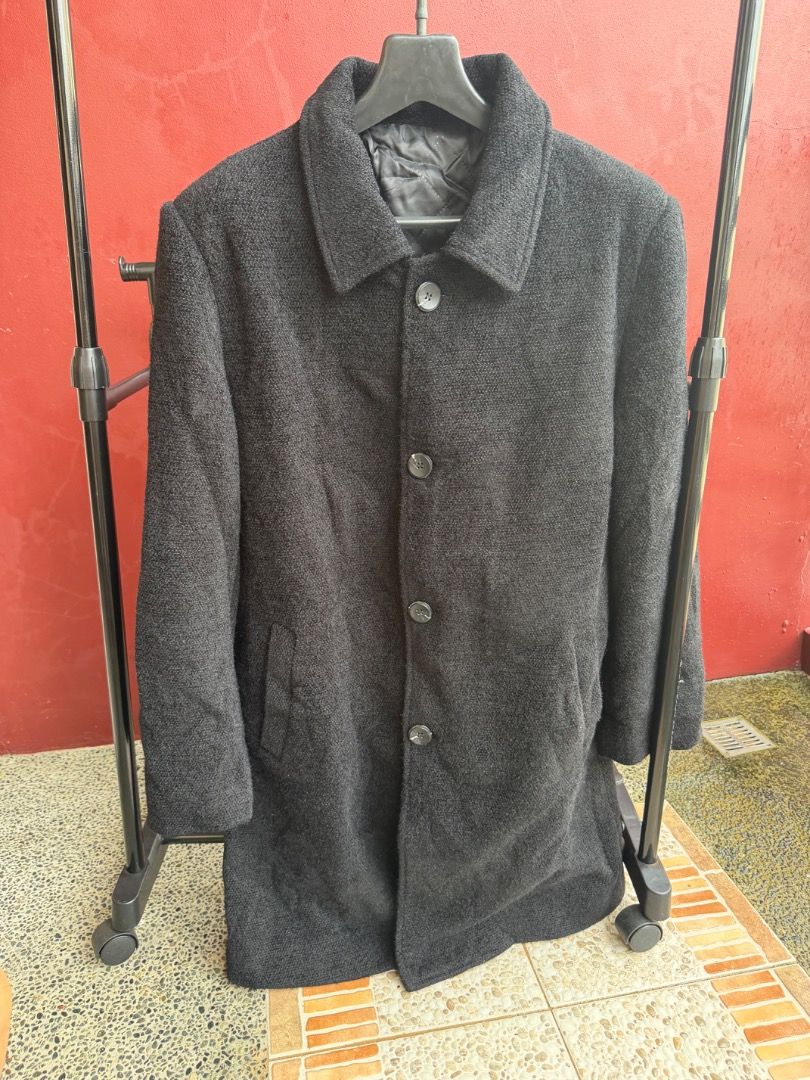 Men's Dark Grey Wool Blend Long Winter Coat (Category: Coats, Jackets and Outerwear) located in Manila. Submitted by transbox (Listing ID 1458545468, Image 1). Description: - Dark grey textured long coat - Button-up front with collared neckline - Fully lined interior - Two front pockets - Ideal for cooler weather - Measurements: Length approx. 36 inches, Chest approx. 22 inches - Not thrifted.