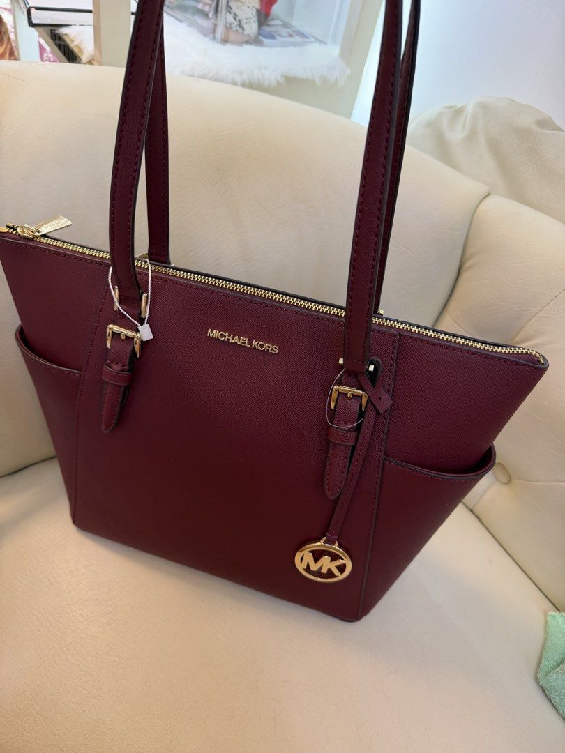 Michael Kors Charlotte in Dark Cherry (Category: Luxury Bags & Wallets) located in Cavite. Submitted by purgingmycloset888 (Listing ID 1458617282, Image 2). Description: Authentic Michael Kors Charlotte Zipped Tote in Dark Cherry Original Price: $448 (around ₱27k) Rfs: bawas gamit.