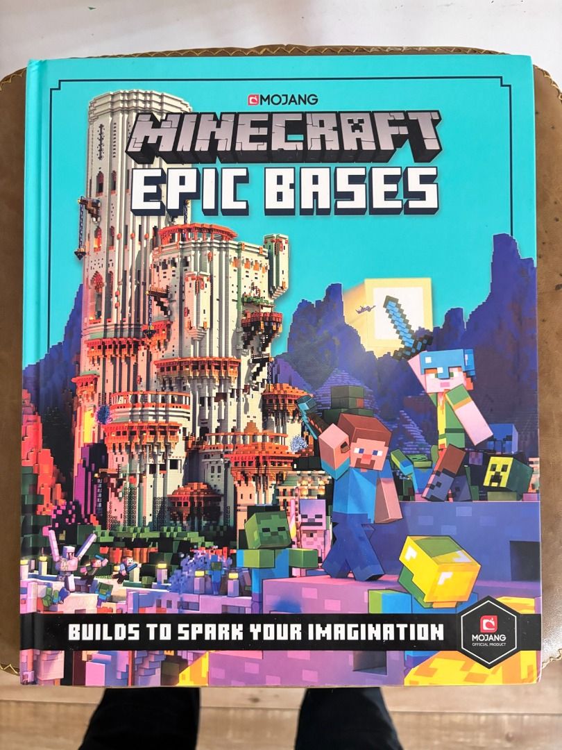 Minecraft Epic Bases Book by Mojang (Category: Storybooks) located in Makati City. Submitted by jed.castillo (Listing ID 1458549520, Image 1). Description: This book is the ultimate masterclass for any player looking to design and build mind-blowing structures—from hidden underwater bunkers and floating islands to massive, unraidable castles!It is packed with brilliant architectural inspiration, exploded diagrams, and insider design secrets. This