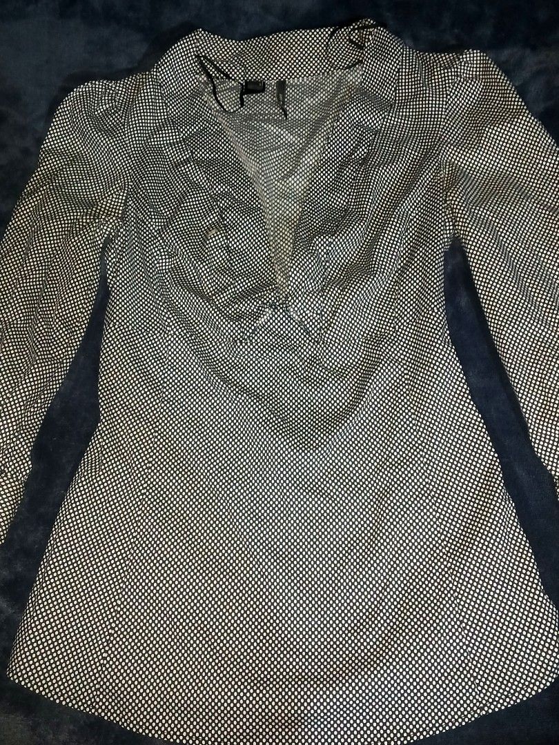 MNG SUIT Polka Dot Blouse Size XS (Category: Blouses) located in Manila. Submitted by icamalicdem29 (Listing ID 1458665455, Image 1). Description: - Cute MNG SUIT blouse - Classic polka dot pattern - Long sleeves - V-neckline with ruffle detail - Versatile for dressing up or down - Made in China - Tagged size XS.