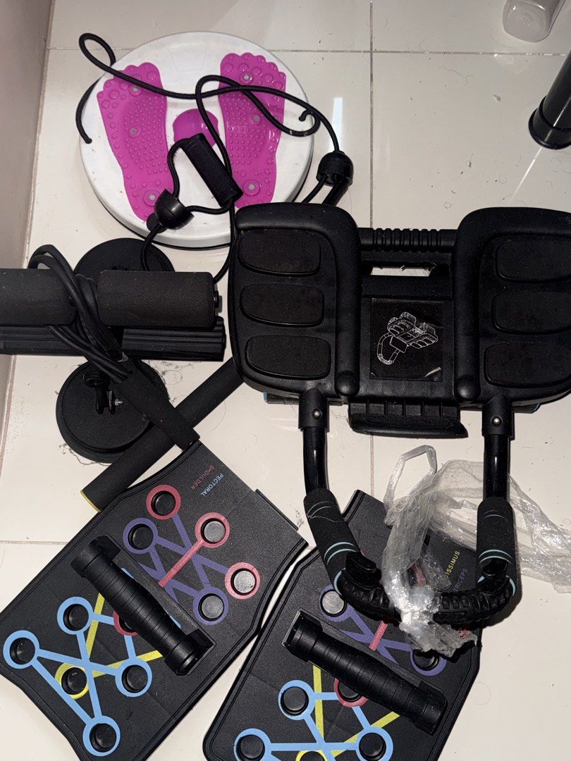 Multi-functional Home Gym Equipment Set with Push-up Board (Category: Weights & Dumbbells) located in Quezon City. Submitted by gavinarevalo (Listing ID 1458529948, Image 1). Description: - Complete home gym set for a full body workout. - Includes a push-up board with multiple grip positions. - Comes with a sit-up assistant. - Features a twisting waist disc for core training. - Ideal for strength training and cardio at home. - All pieces are blac