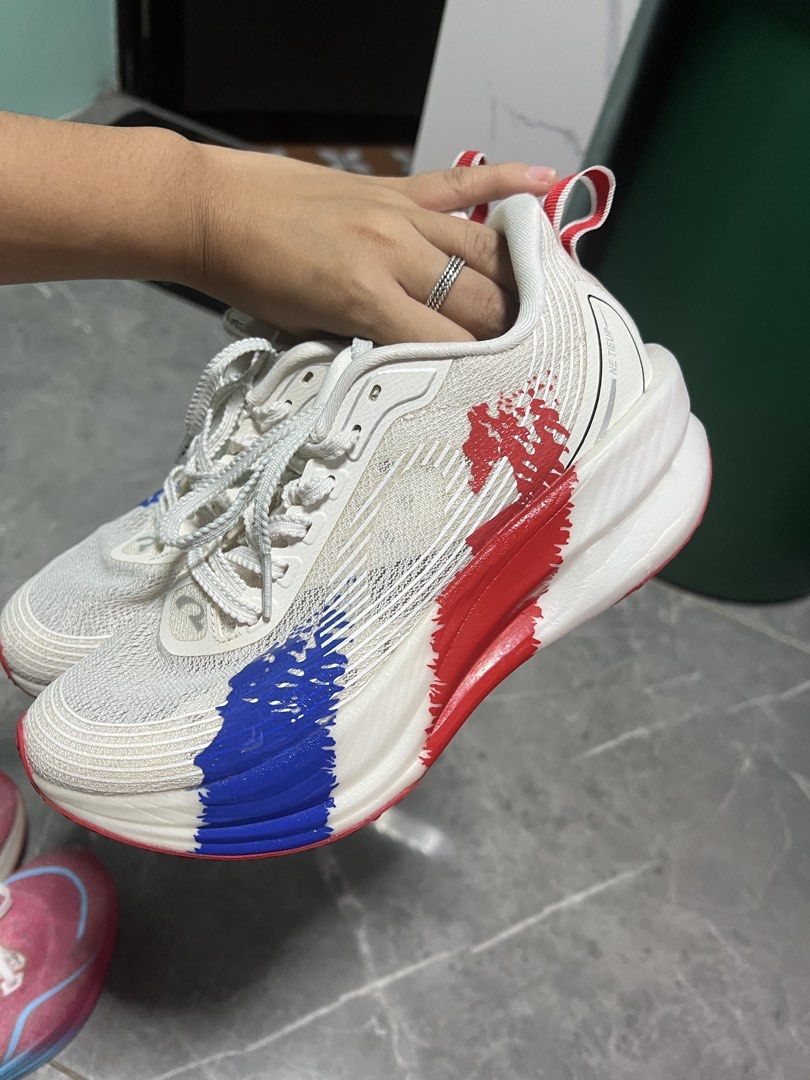 NEIRK White Red Blue Running Shoes (Category: Sneakers) located in Manila. Submitted by nltcc (Listing ID 1458619452, Image 2). Description: - Size 37 womens running shoes. 2100 po nabili sa online, 900 nalang po - QC Commonwealth loc pwede po ako mismo magbigay deliver or meet up basta around qc - lalmove if d keri White NEIRK running shoes - Eye-catching red and blue paint splatter design - Lightweight and breathable mesh upper for comfort - Un