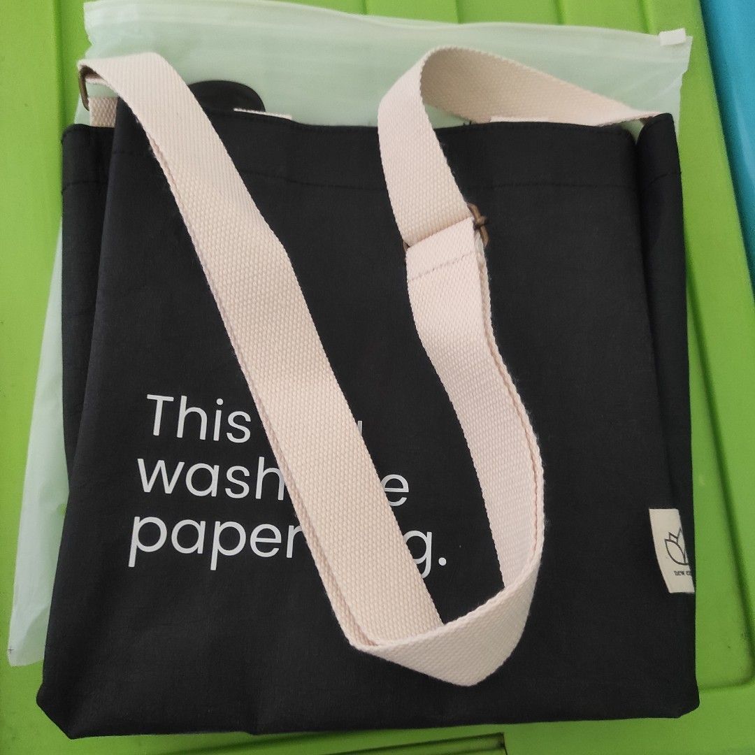 New Earth Washable Paper Bag - Black (Category: Tote Bags) located in Quezon City. Submitted by mjp918557503 (Listing ID 1458563591, Image 2). Description: New Earth Ecocraft Washable Sling Bag - Black PRODUCT SPECIFICS: Length: 10 inches Width: 4 inches Height: 10 inches Sling: 24 inches maximum length Short Handle: 5 inches Comes with two handles WHY WILL YOU LOVE NEW EARTH SLING WASHABLE PAPER BAG? - Sustainably-made with natural cellulose fib