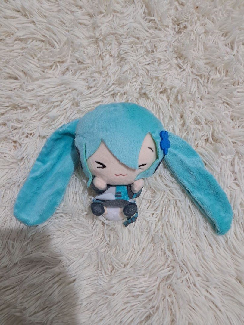 NEW Hatsune Miku Plush Keychain with tags (Category: Plushies & Soft Toys) located in Las Pinas. Submitted by thestylecapital (Listing ID 1458659241, Image 1). Description: - Adorable Hatsune Miku plushie - Approximately 6-7 inches tall - Super soft and cuddly material - Ideal gift for any Hatsune Miku enthusiast - Includes a keychain loop for easy attachment - Great for decorating bags, backpacks, or your room Brand new with tags Official 💕.