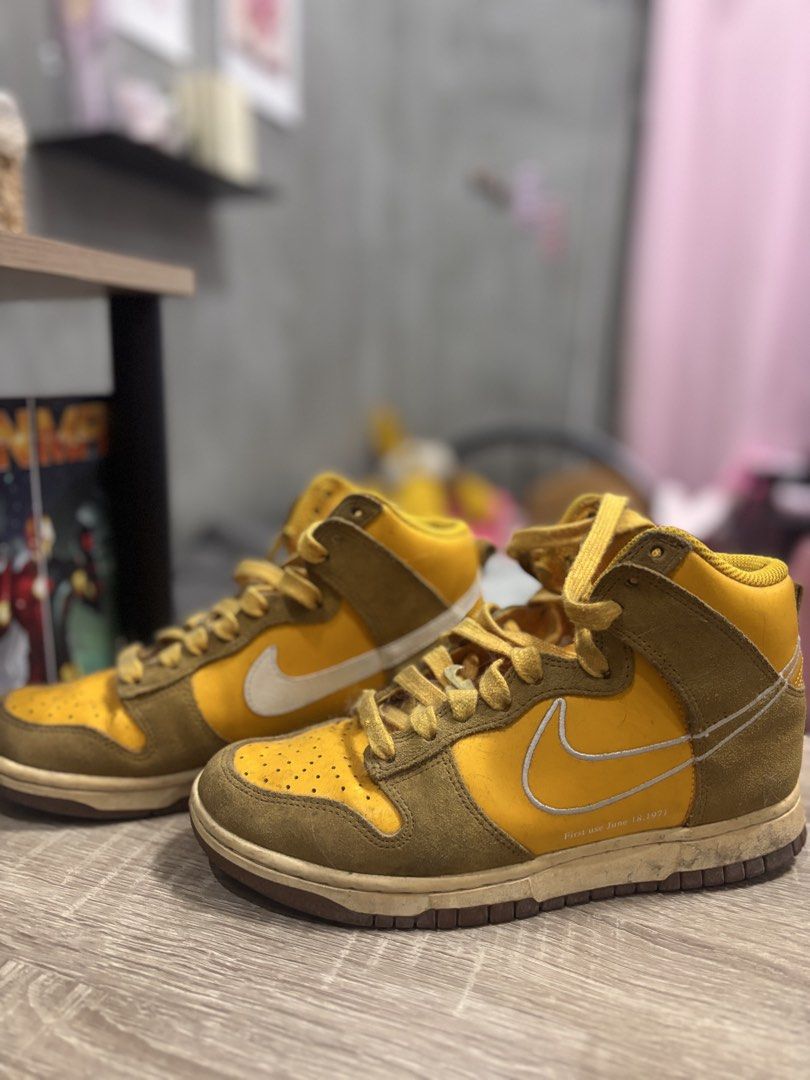 Nike Dunk High "First Use" Yellow Brown (Category: Sneakers) located in Manila. Submitted by theresesam56170 (Listing ID 1458680924, Image 2). Description: - Original Nike Dunk High sneakers - Color: Yellow and Brown - Special Feature: "First Use June 18, 1971" detail on the side - Style: Classic high-top silhouette - Perfect for: Casual wear - Condition: Shows some signs of wear, but plenty of life left. -no Box.
