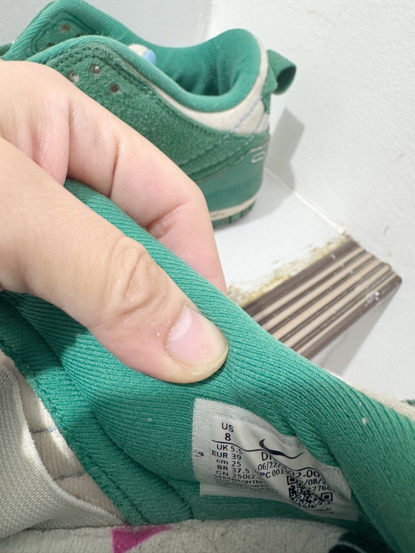 Nike Dunk Low Green Cream (Category: Sneakers) located in Iloilo. Submitted by itsdanicanicole (Listing ID 1458608702, Image 2). Description: - Nike Dunk Low - Color: Green and Cream - Size: US 8 - Condition: Shows some signs of wear on soles and suede - Note: Laces are missing - Perfect for casual wear and everyday style.