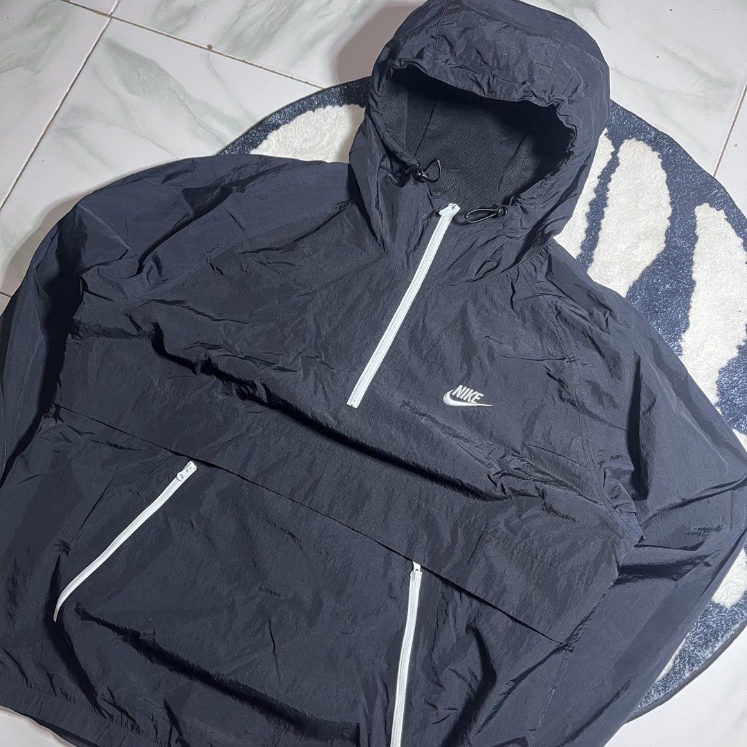 Nike half zip kangaroo pocket pouch wind breaker (Category: Coats, Jackets and Outerwear) located in Naga. Submitted by noheadguy (Listing ID 1458662875, Image 2). Description: Nike half zip kangaroo pocket pouch wind breaker Solid crispy condition as new. Brand new condition Color rate:100000/10 No issue No pin holes Complete tags Boxy fit Dimes are also in the picture for references W:25.5 L:27 Unli VC if you want to check it out 📍Camarines Su