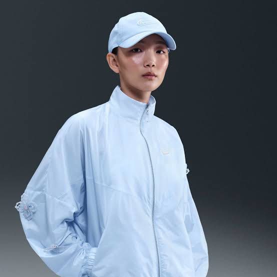 Nike Track Jacket (Category: Coats, Jackets and Outerwear) located in Taguig. Submitted by xandrascloset (Listing ID 1458558115, Image 2). Description: - Light blue Nike track jacket - Zip-up front - Stand-up collar - Cute butterfly details on sleeves removable - Lightweight and breezy feel - Ideal for casual wear or light workouts.
