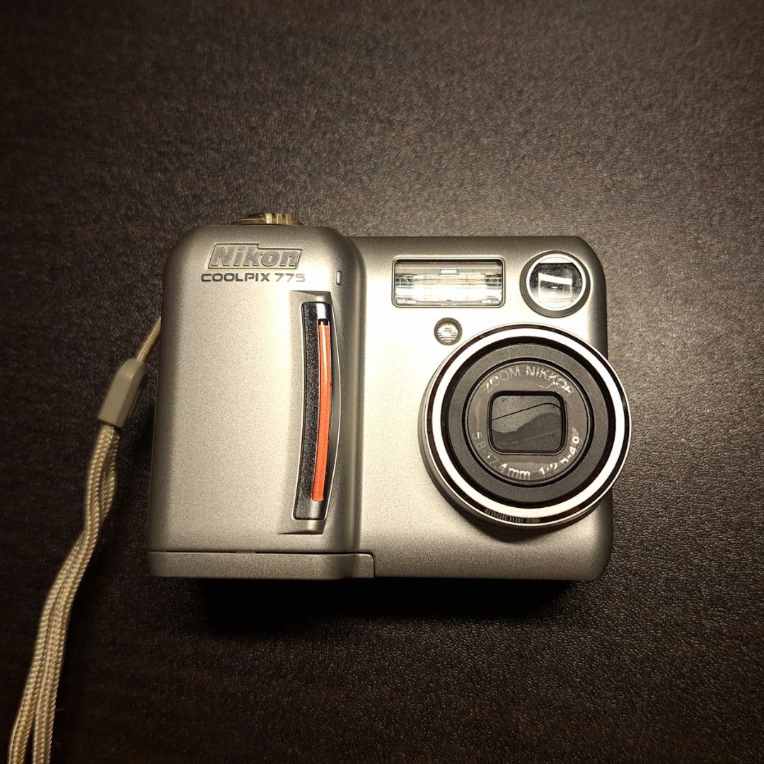 NIKON COOLPIX 775 DIGITAL CAMERA (Category: Cameras) located in Manila. Submitted by weewomp (Listing ID 1458526666, Image 3). Description: NIKON COOLPIX 775 • Inclusions: Battery,Battery Charger, Case, Camera strap, and CompactFlash Disk • minor issues: lcd burn, minor scratches, sign of usage • 9.8/10 condition • buyer should shoulder the sf.