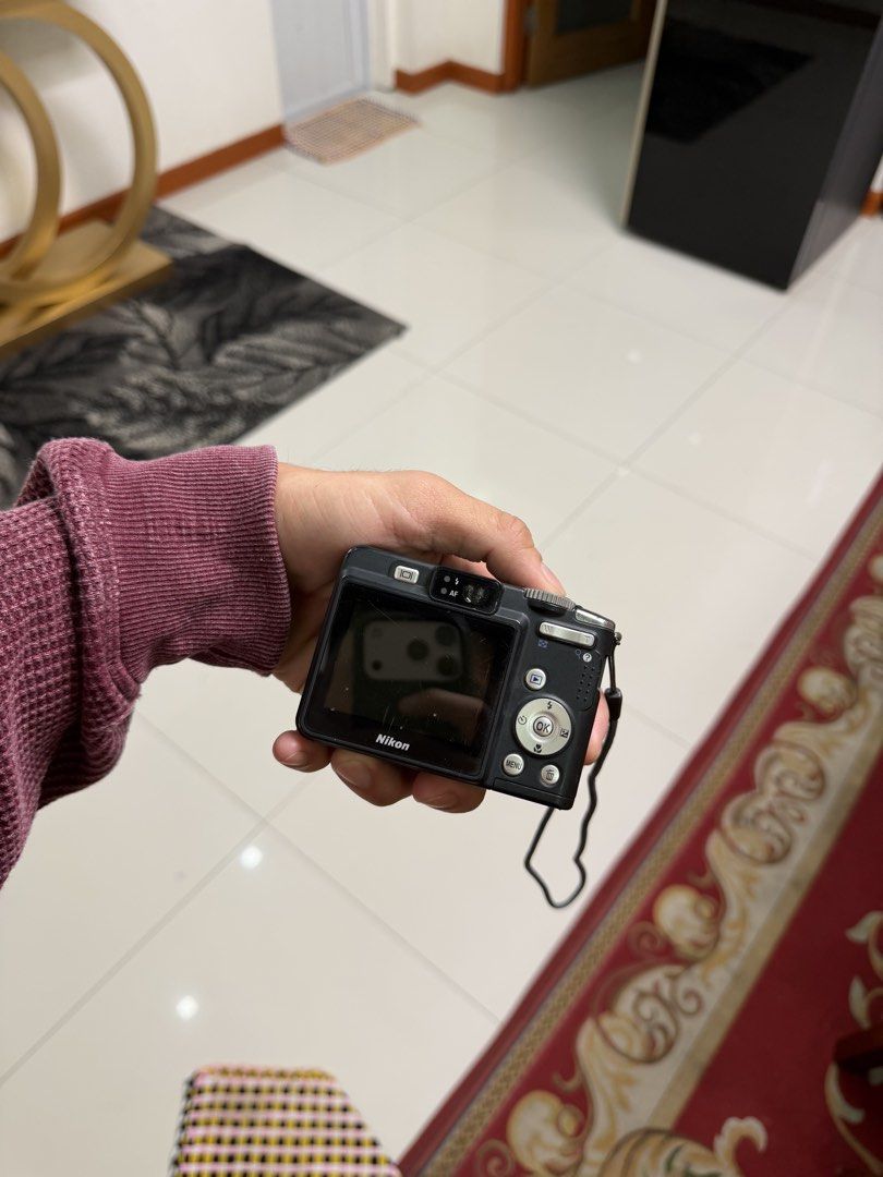Nikon Coolpix P50 Digital Camera with Accessories (Category: Cameras) located in Manila. Submitted by ibejerome062342 (Listing ID 1458668534, Image 3). Description: - Nikon Coolpix digital camera - Ideal for casual photography - Includes charger - Batteries included - Comes with a 128GB SD card - Camera bag included - Tested and confirmed working.