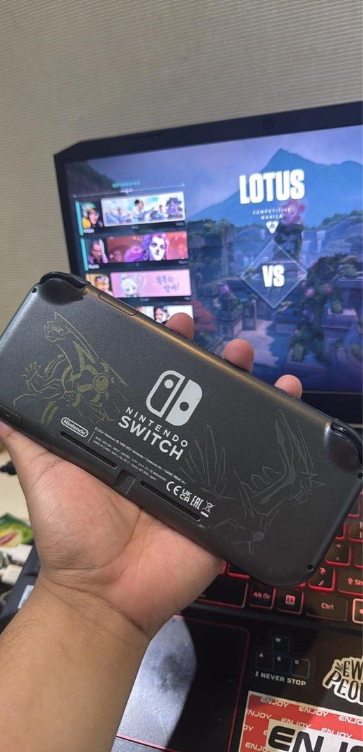 Nintendo Switch Lite Dialga & Palkia Edition (Category: Nintendo) located in Manila. Submitted by natchu67 (Listing ID 1458665465, Image 2). Description: This is the sleek grey model featuring the iconic Dialga and Palkia artwork etched in metallic gold on the back a true collector’s piece that stands out from standard Switch Lites. • Solid Build - Integrated controls (no Joy-Con drift worries), crisp 5.5” touchscreen, and good battery life, Type