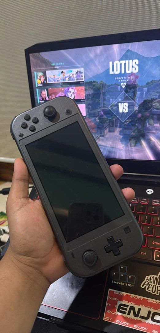 Nintendo Switch Lite Dialga & Palkia Edition (Category: Nintendo) located in Manila. Submitted by natchu67 (Listing ID 1458665465, Image 3). Description: This is the sleek grey model featuring the iconic Dialga and Palkia artwork etched in metallic gold on the back a true collector’s piece that stands out from standard Switch Lites. • Solid Build - Integrated controls (no Joy-Con drift worries), crisp 5.5” touchscreen, and good battery life, Type