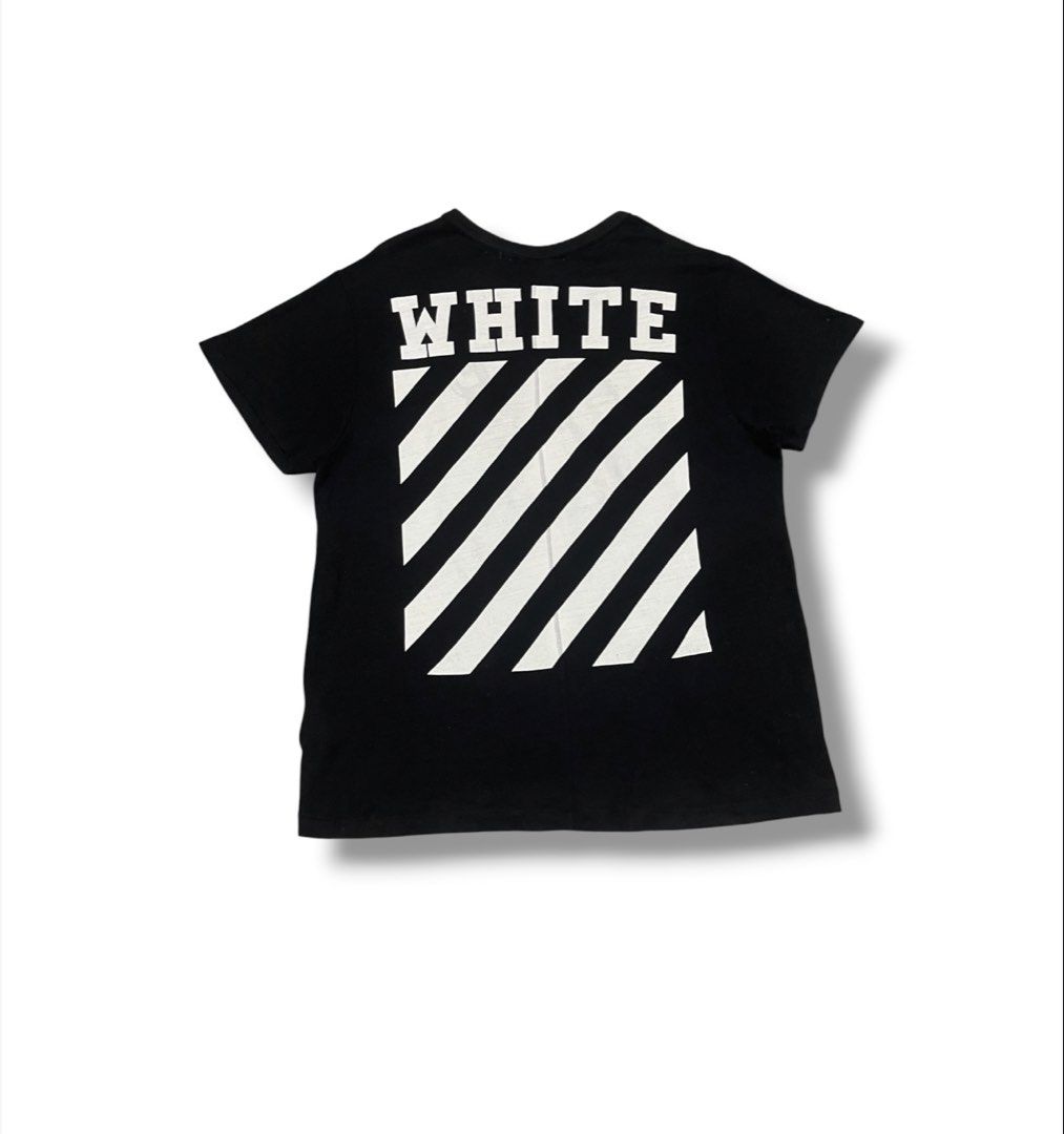 Off-White Shirt (Category: Tshirts & Polo Shirts ) located in Bulacan. Submitted by sanjisthrift (Listing ID 1458603734, Image 1). Description: Size XL Width 23 Length 29 Good Condition 9/10 Faded print sa harap Minor stainsa harap.