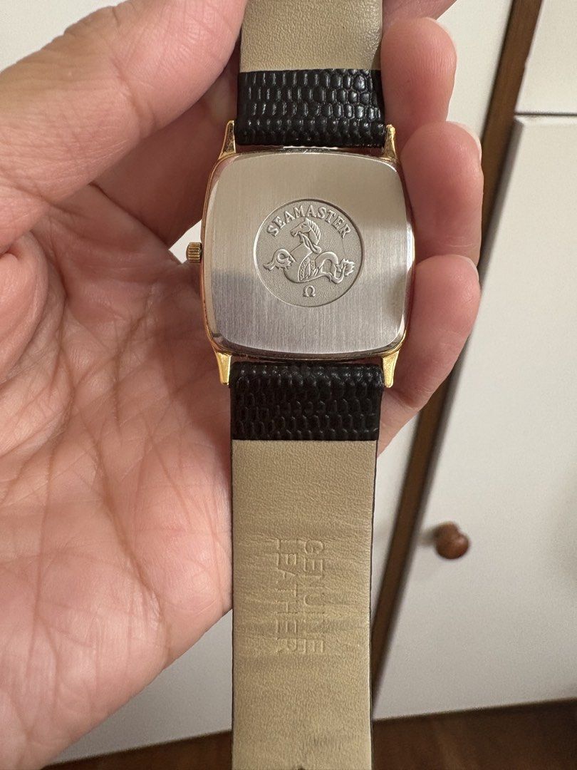 Omega Seamaster Quartz Gold Plated Watch (Category: Luxury Watches) located in Manila. Submitted by pristineclosetph (Listing ID 1458566672, Image 3). Description: - Vintage Omega Seamaster watch - Gold plated casing - Champagne dial with date window at 3 o'clock - Black leather strap with gold buckle - Swiss made - Quartz movement.