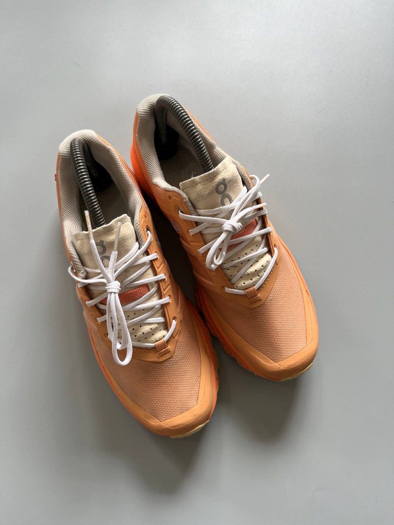 ONCLOUDVENTURE ORANGE COPPER (8US WMNS) (Category: Sneakers) located in Baguio. Submitted by grabUrPairs (Listing ID 1458660910, Image 2). Description: EXCELLENT SIGNS OF USAGE 8US WMNS / 39EU PAIR ONLY AUTHENTIC.