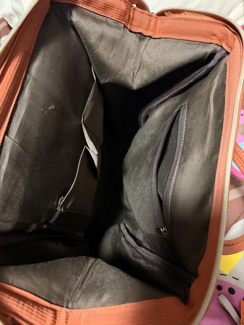 ORIGINAL Anello Brown Faux Leather Backpack (Category: Backpacks) located in Paranaque City. Submitted by keyas.preloved (Listing ID 1458579856, Image 3). Description: - Brown faux leather backpack - Main compartment with internal pockets - Front zippered pocket - Two side pockets - Adjustable straps - Exterior shows some scuffs and marks, particularly on the back but you can wash it for it to be removed - Interior is clean.