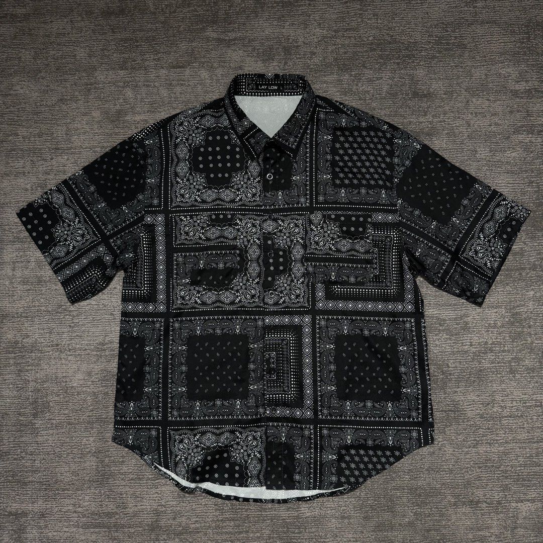 Paisley bandana polo (Category: Activewear) located in San Carlos. Submitted by used.but.not.abused. (Listing ID 1458564627, Image 3). Description: Top: paisley bandana button down polo Width x Length: 23x28 Condition: 9/10 Issue: none.