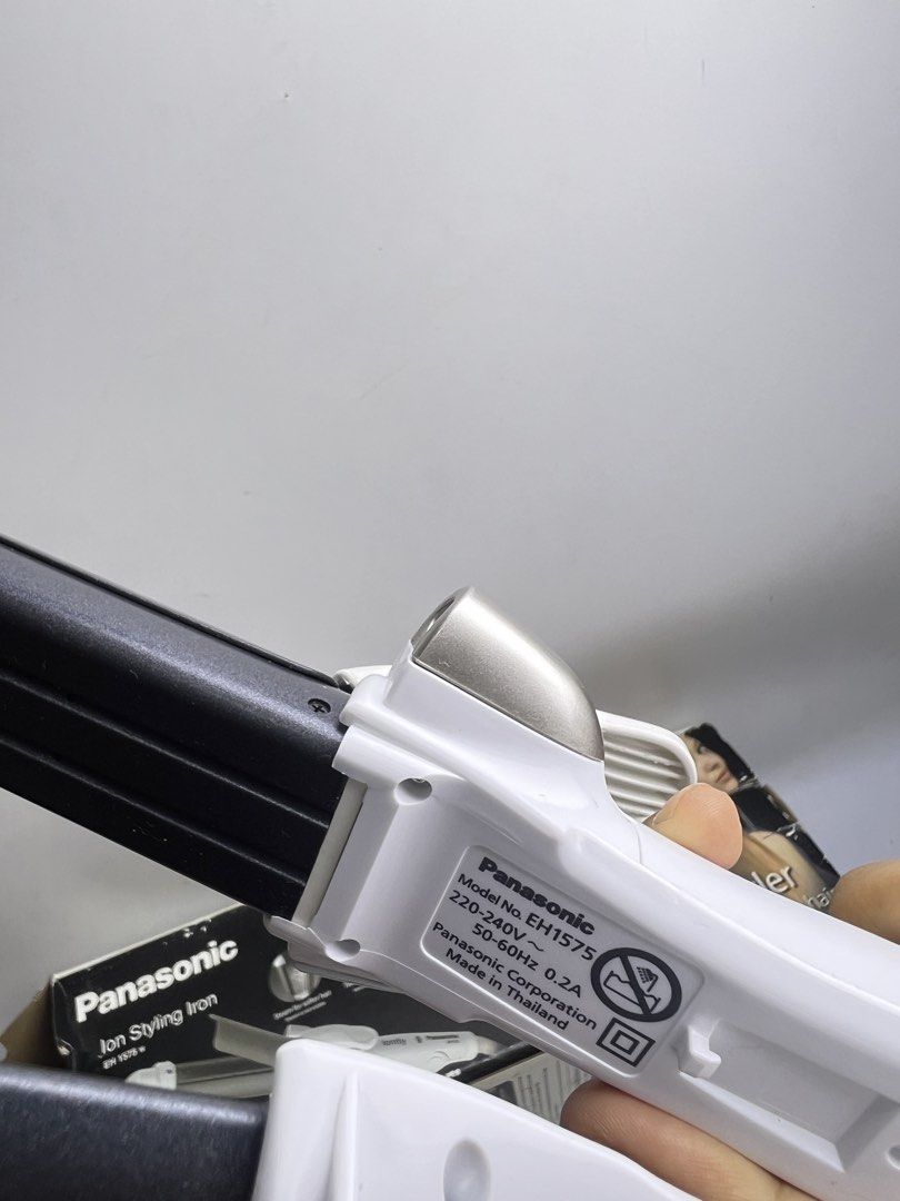 Panasonic Ion Styling Iron Two-in-One Styler EH1575 (Category: Hair) located in Baguio. Submitted by chiechie1234 (Listing ID 1458584190, Image 2). Description: - Panasonic Ion Styling Iron EH1575 - 2-in-1 styler for smooth, glossy hair - Features advanced ion technology - Works with 220-240V power supply - Made in Thailand - Comes with original box.