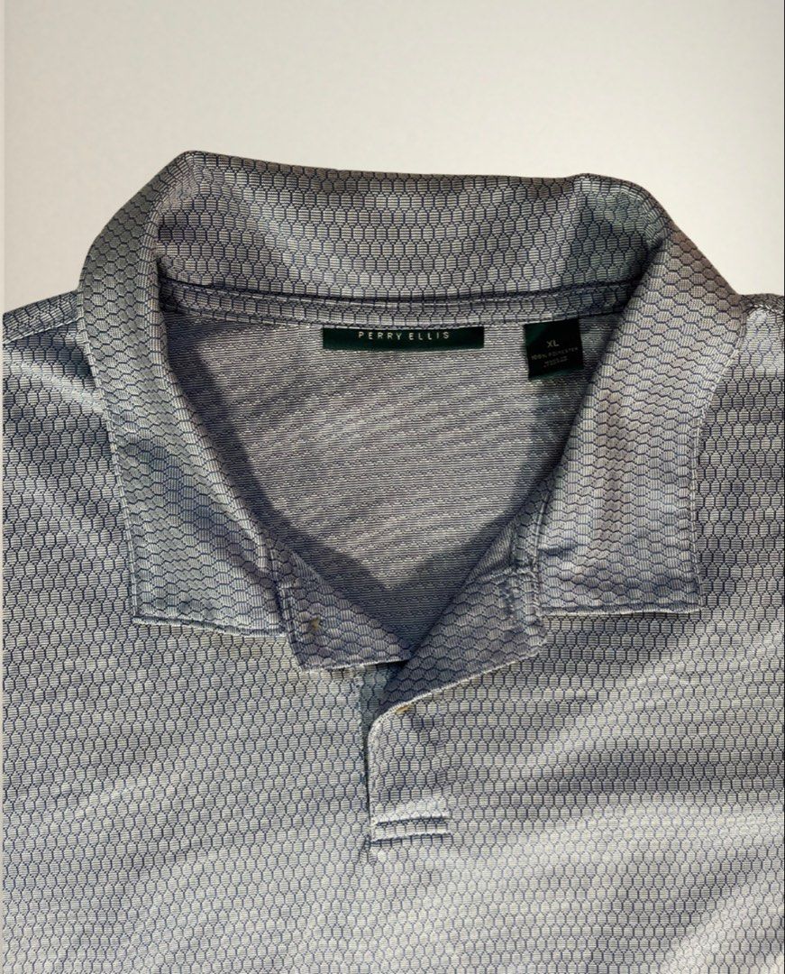 Perry Ellis Men's Blue Geometric Pattern Polo Shirt (Category: Tshirts & Polo Shirts ) located in Las Pinas. Submitted by josepsthings (Listing ID 1458596675, Image 2). Description: Length - 28 in Width - 23.5 in.