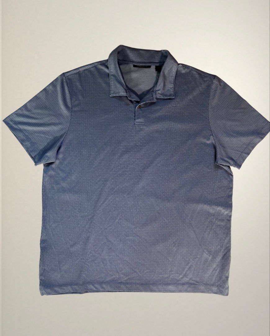 Perry Ellis Men's Blue Geometric Pattern Polo Shirt (Category: Tshirts & Polo Shirts ) located in Las Pinas. Submitted by josepsthings (Listing ID 1458596675, Image 1). Description: Length - 28 in Width - 23.5 in.