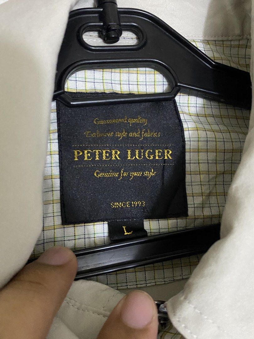 Peter Luger Jacket Harrington (Category: Coats, Jackets and Outerwear) located in Caloocan City. Submitted by royalturtle-1071 (Listing ID 1458590818, Image 2). Description: - Lightweight jacket from Peter Luger - Classic collar with button closure - Two front pockets with button details - Elasticated hem and cuffs for a comfortable fit - Ideal for versatile layering.