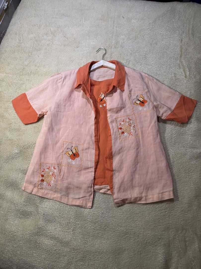 Pink & Orange Butterfly Embroidered Top Set (Category: Sleeveless) located in Caloocan City. Submitted by poch.queue (Listing ID 1458546717, Image 1). Description: - Orange top set with collar and cuff - Butterflies and floral details - Comes with a matching orange sleeveless inner top..