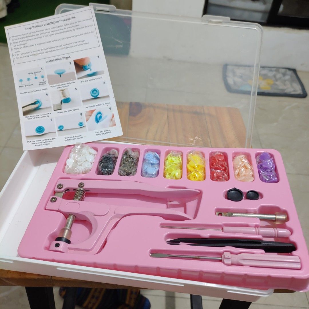 Pink Snap Button Pliers Kit with Assorted Snaps and Tools (Category: Craft Supplies & Tools) located in Manila. Submitted by purecloud_e63fae (Listing ID 1458594360, Image 3). Description: Bought for ₱480, selling for only ₱300. - Complete set with tools - Assorted snap buttons - With storage box - Good for DIY/crochet/sewing projects Condition: Brand new / unused RFS: Nadoble ang bili.