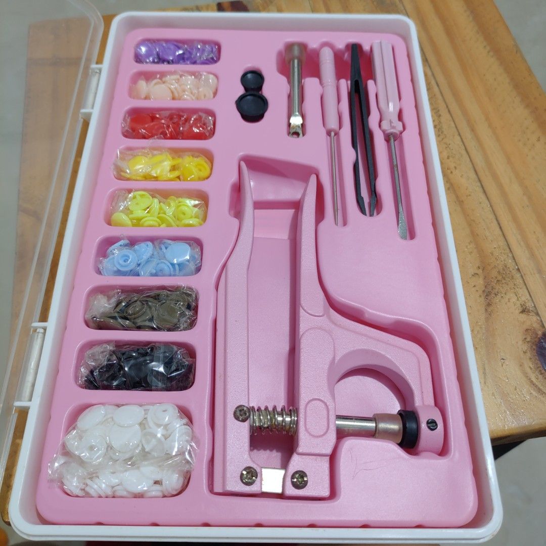 Pink Snap Button Pliers Kit with Assorted Snaps and Tools (Category: Craft Supplies & Tools) located in Manila. Submitted by purecloud_e63fae (Listing ID 1458594360, Image 2). Description: Bought for ₱480, selling for only ₱300. - Complete set with tools - Assorted snap buttons - With storage box - Good for DIY/crochet/sewing projects Condition: Brand new / unused RFS: Nadoble ang bili.