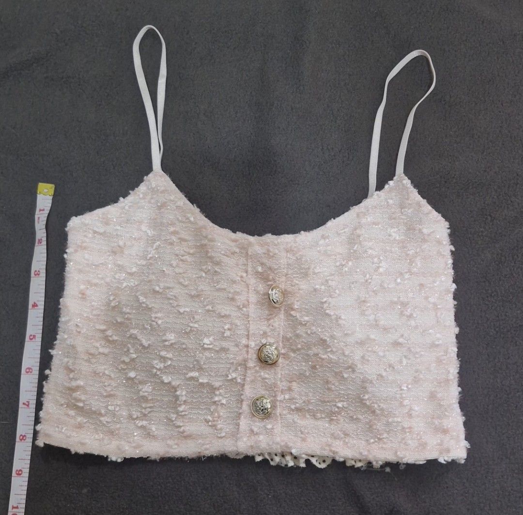 Pink Tweed Button Up Crop Top with Straps (Category: Others Tops) located in Bacoor. Submitted by akosibianca (Listing ID 1458575728, Image 1). Description: - Adorable pink tweed crop top - Textured fabric with subtle sparkle - Three silver button front closure - Adjustable straps for a perfect fit - Stylishly pairs with high-waisted bottoms - Ideal for night outs or casual wear.