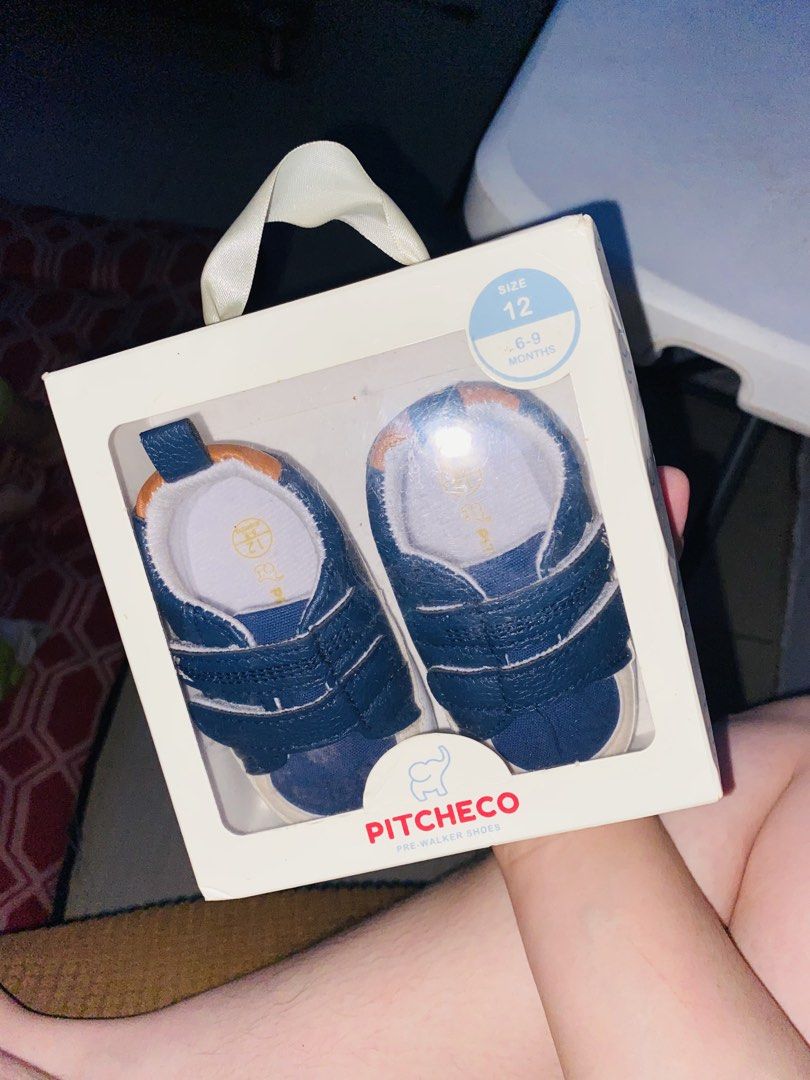 Pitcheco Pre-Walker Shoes Size 12 (6-9 Months) (Category: Babies & Kids Fashion) located in Manila. Submitted by swiftfish-afc9a7 (Listing ID 1458564414, Image 1). Description: - Pitch & Co pre-walker shoes - Size 12 (fits 6-9 months) - Dark blue color - Easy velcro straps for quick on/off - Comes with original box - Purchased from SM Store once lang nagamit ni baby, super good condition not even a scratch🫶🏻.