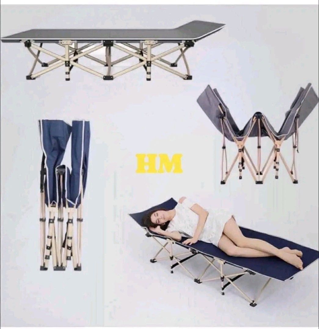 Portable Folding Camping Cot Bed (Category: Hiking & Camping) located in Manila. Submitted by marvieobordo (Listing ID 1458675671, Image 1). Description: - Easy to set up and fold away - Great for camping trips or as an extra bed - Sturdy metal frame - Dark blue fabric - Lightweight and portable - Provides a comfortable place to rest anywhere.