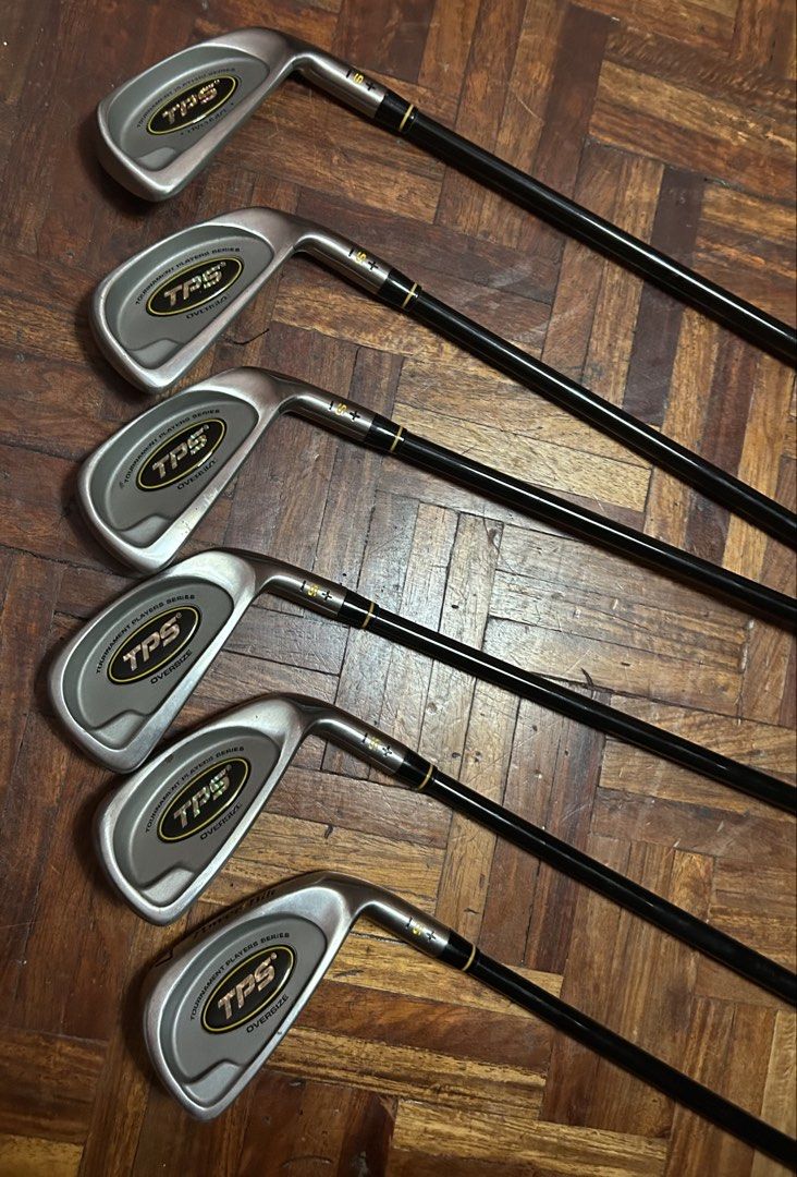 PowerBilt TPS Oversize Graphite Iron Set Golf Clubs (Category: Golf) located in Caloocan City. Submitted by dillydadi67 (Listing ID 1458632231, Image 1). Description: - Set includes PowerBilt TPS Oversize irons: 3-iron through 8-iron. - Features regular flex graphite shafts for optimal swing speed. - Equipped with original PowerBilt branded grips. - Negotiable.