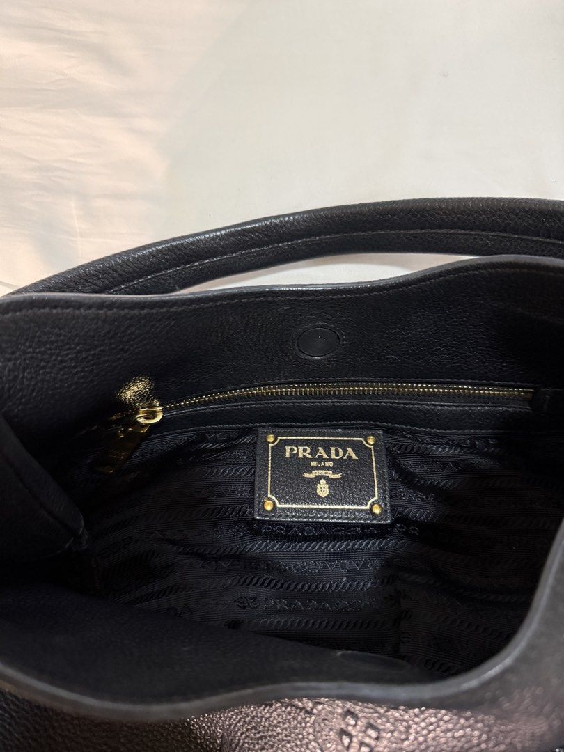 Prada Vitello Phenix Hobo Bag Black Leather (Category: Luxury Bags & Wallets) located in Quezon City. Submitted by happymommy01 (Listing ID 1458563966, Image 3). Description: - Authentic Prada Hobo Bag - Color: Black - Material: Vitello Phenix Leather - Model: 1BC051 - Purchase Year: 2019 - Includes: Authenticity Cards, Dust Bag.