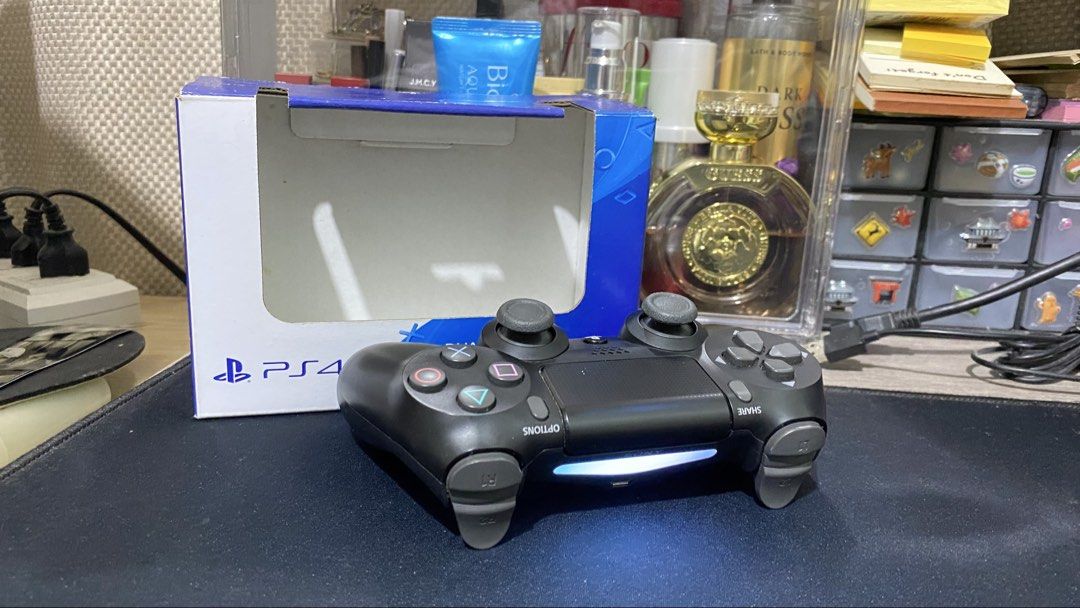 PS4 Dualshock 4 Wireless Controller (Pre-Owned) (Category: Controllers) located in Taguig. Submitted by aizen007 (Listing ID 1458579935, Image 2). Description: - Can send more pics if needed - Price Negotiable.