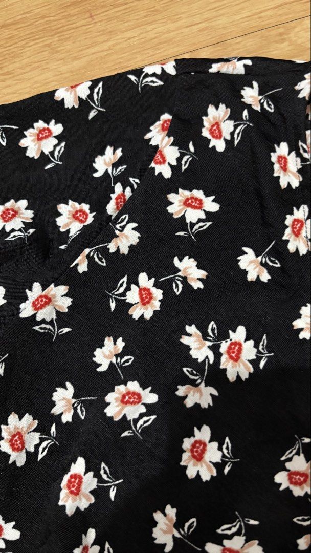 Pull & Bear Black Floral Wrap Mini Dress Size S (Category: Dresses) located in Cainta. Submitted by prelovebytish (Listing ID 1458526249, Image 3). Description: - Cute black mini dress - White and red floral print - Short sleeves - Flattering wrap style - Lightweight and flowy fabric - Perfect for casual outings or a day out - Made in Turkey - Size S.