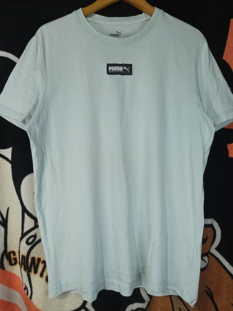 Puma T-shirt (Category: Tshirts & Polo Shirts ) located in Castilla. Submitted by stignapamorma (Listing ID 1458618749, Image 1). Description: Branded T-shirt ( Thrifted ) Minimal Issue / Blurred Logo Size - 21.5x28 Condition - Excellent Color Rate - 9/10 Issue - Minimal Loose Neckline Price - 250+SF.