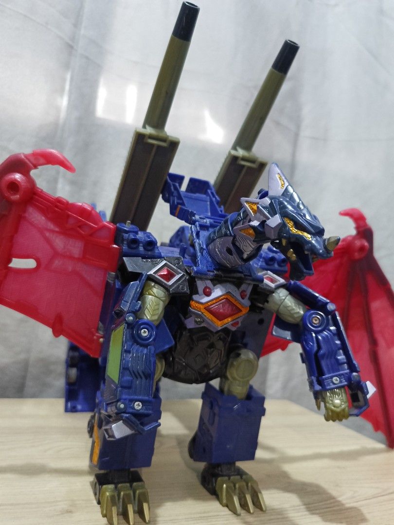 RARE: DX Drag-On / Webdiver Dragon — Takara 2001 (Category: Action & Battle Toys) located in Cavite. Submitted by bodega_ni_kiks11 (Listing ID 1458613451, Image 2). Description: RARE: DX Drag-On / Webdiver Dragon — Takara 2001 Very hard to find piece. - Transforms: Dragon → Truck → Robot - Kept mostly displayed in dragon form — never personally transformed to truck mode - ⚠️ Missing 1 fist part + minor age-related discoloration - Solid overall — 