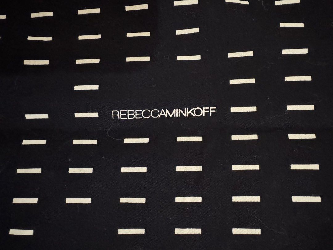 Rebecca Minkoff Dust Bag (Category: Luxury Accessories) located in Pasig City. Submitted by topbrandpursuits (Listing ID 1458563677, Image 2). Description: - Brand: Rebecca Minkoff - Color: Black with white dash pattern - Size: 23x19.5 inches .